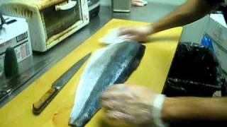 Fresh 18 pound yellowtail into sushi/sashimi.