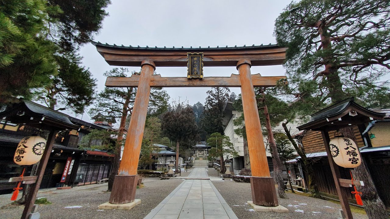 Two travelers embark on an adventure in Takayama, immersing themselves in the rich culture at Matsuri no Mori museum.