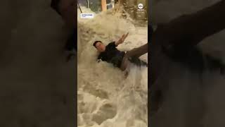 Flood waters crash through hotel doors in Hong Kong