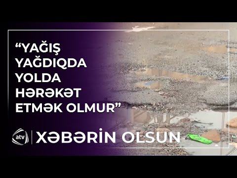 Asfalt örtüyü dağılıb, küçəni su basıb
