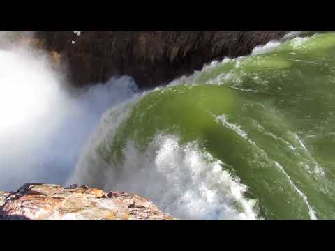 You can hike down nine switchbacks to stand right at the brink of Lower Falls!