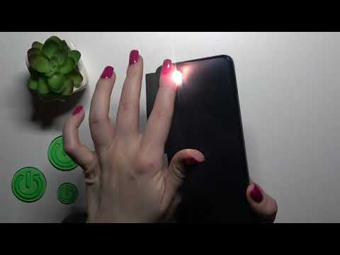 How to Switch On the Flashlight on a MOTOROLA Moto E32s - Turn On the Torch