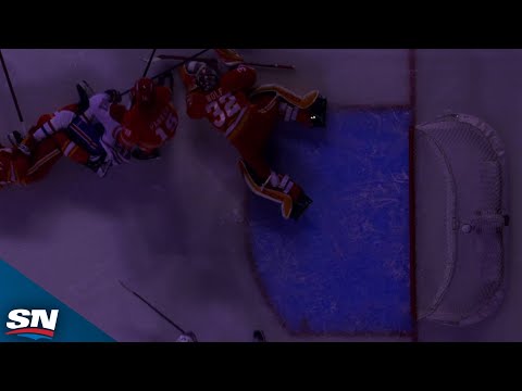 Flames' Dustin Wolf Makes A Great Save While In The Dark