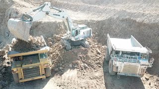 Huge Liebherr 984 Excavator Loading Caterpillar 777C-D Dumpers - Sotiriadis/Labrianidis - Drone View