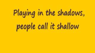 example playing in the shadows lyrics