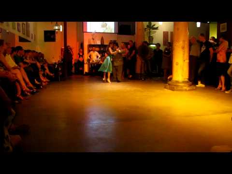  Vanessa Fatauros  and  Aoniken Quiroga  are  dancing  to  a  tango