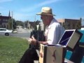 A Old Man Playing Acordion at North Sydney Cape ...