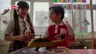 Parle Boy gluing his helicopter with glue