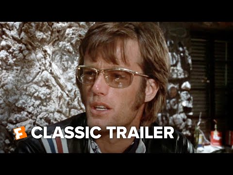 Trailer frame: Jack Nicholson’s George Hanson on the back of the bike, arms spread, dissolving to highway