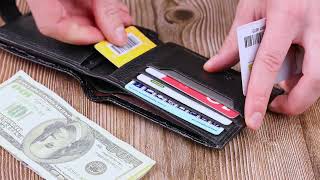 Стильний чоловічий гаманець із фактурної шкіри під рептилію KARYA 21065 чорний