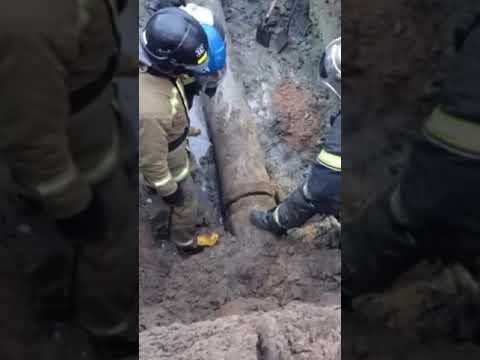 Drunk Russian guy gets stuck in sewer pipe