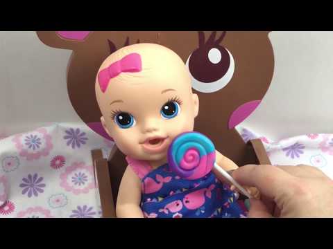 Baby Alive Sips n Cuddles Doll Ariel Falls Down and Drinks Bottle and eats a Lollipop Video