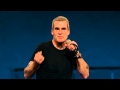 Henry Rollins on a young man standing in the darkness