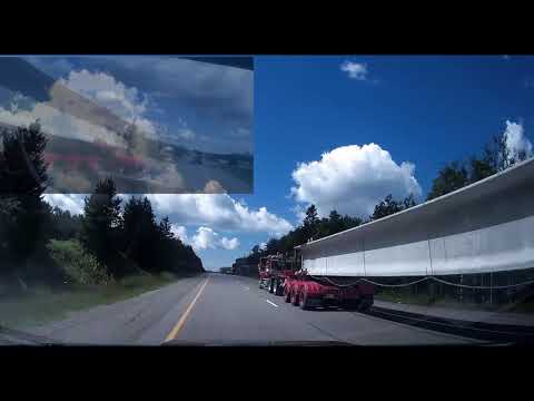 Bridge beams going to Sault Saint Marie, beautiful scenery.  Superload or oversize load assist.