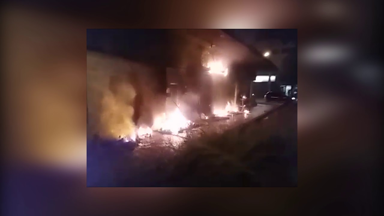 Imagem: Fogo em lixo danifica fachada de agência da Caixa na Padre Café