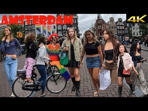 Amsterdam in September. walking tour at Leidsestraat. Sale time and busy Amsterdam