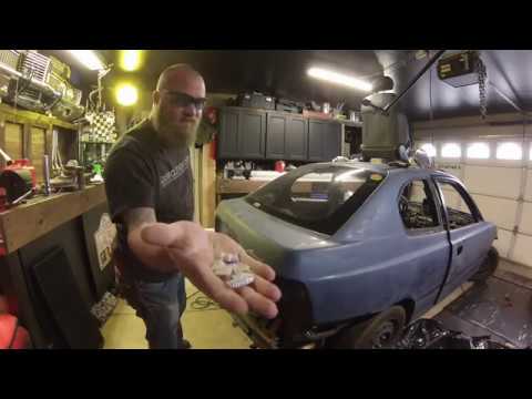 Can you break glass with a piece of spark plug and gravity? (drop test)