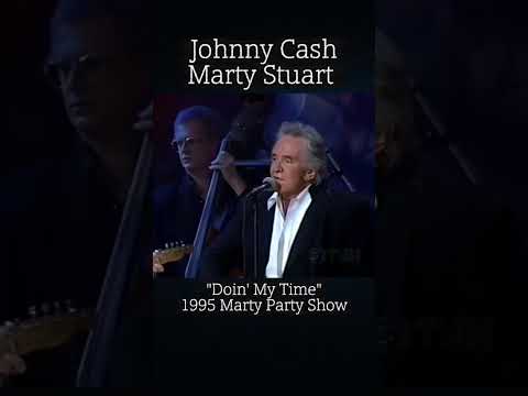 Johnny Cash and Marty Stuart performing on the Marty Party Show in 1995 with the song  Doin' My Time