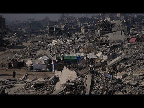 Scholar searches rubble for his books in Gaza