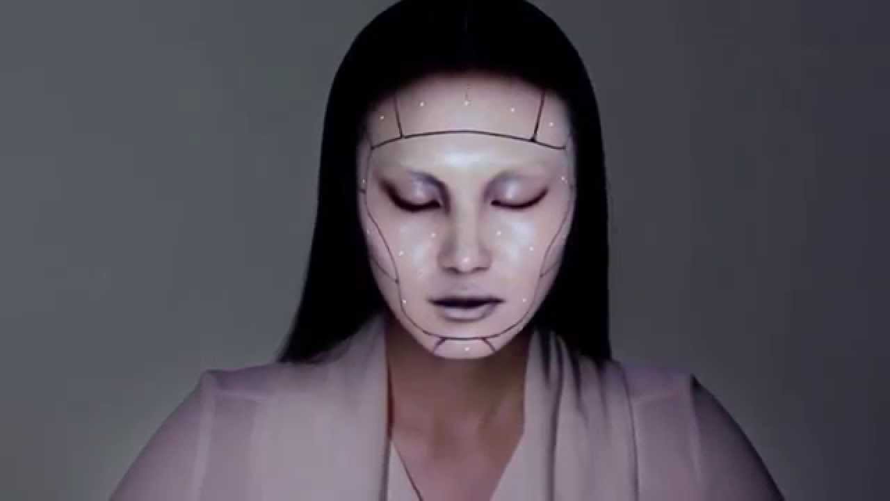 Real-Time Face Tracking & 3D Projection Mapping