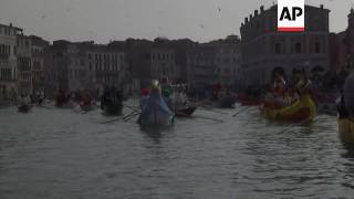 Traditional boats sail in Venice Carnival Parade