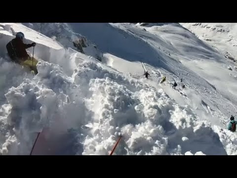Skier films in an avalanche