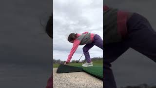 Ella golfing