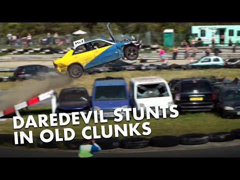 Drivers leap over cars in the 2021 Car Jumping Competition