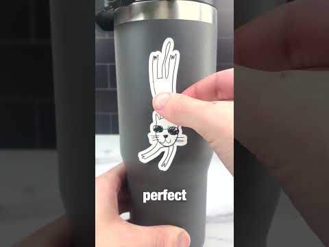 Part of a video titled How to put stickers on bottles with no bubbles! #stickers - YouTube