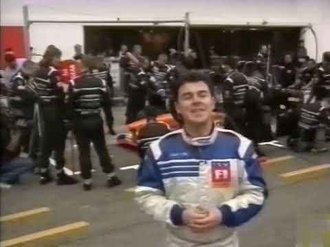 1999 F1 San Marino GP - ITV reporters practice pit stop with Arrows team