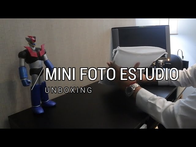 Vídeo relacionado con PULUZ Mini Estudio Fotográfico 20cm, Caja de Luz Fotografía, Caja de Luz Fotos Blanca Plegable con 20 Luces LED + 6 Fondos para Exhibición de Productos