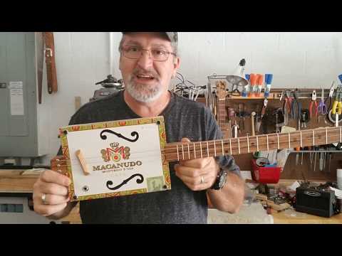 Cigar Box Guitar - MACANUDO box - acoustic  / electric with F holes and oak neck.