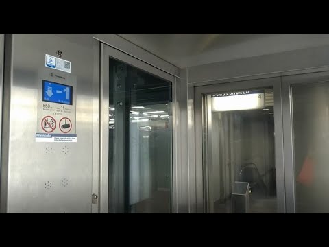 ThyssenKrupp traction glass elevator at Heinrich-Heine-Allee subway station in Düsseldorf