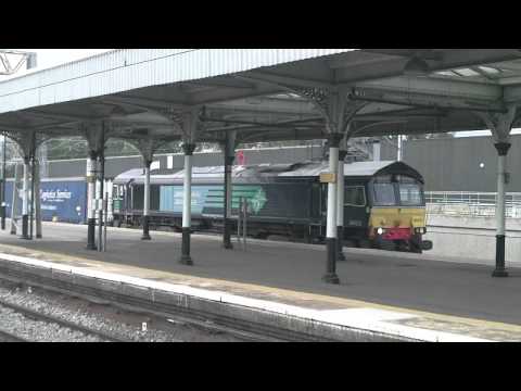 DRS 66423 WITH MALCOLM CONTAINERS PASSES NUNEATON 280811