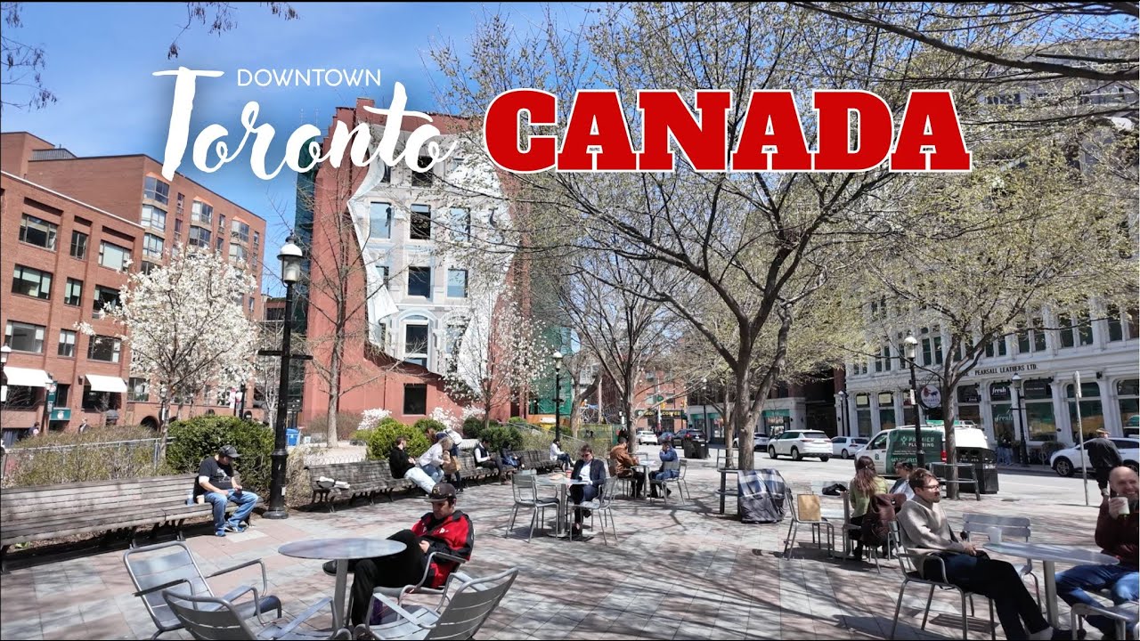 Immersive street-level walking tour through Toronto Yonge Street, Canada, showcasing authentic urban landscapes, local architecture, and the vibrant atmosphere of the city's neighborhoods