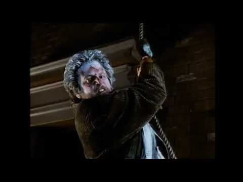 Trailer still: Kevin under Rockefeller Center tree — choral and orchestral cues implied