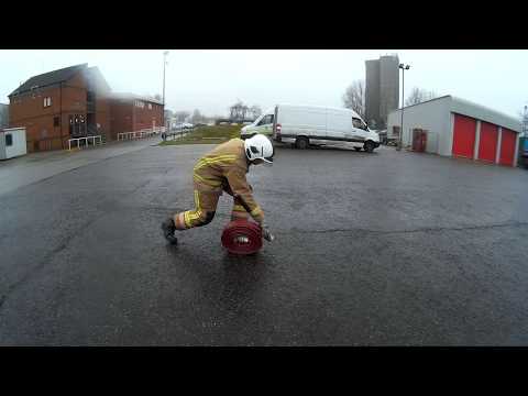 NFRS recruit training - Rolling out 70mm hose