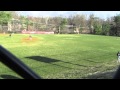 Charles Tsintolas-long drive to left rolls under perimeter fence, 4/2/15