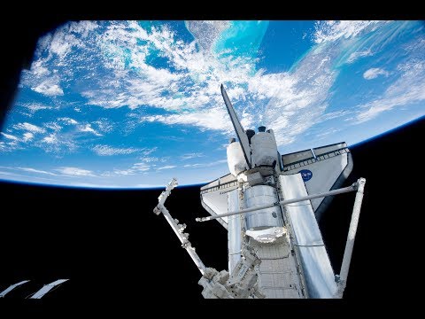 Space Shuttle Discovery over Earth - April 2010