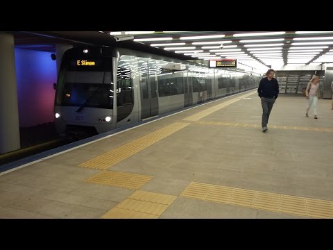 RET Metro 2*Type SG3 op lijn E vertrekt op Rotterdam Centraal richting Slinge