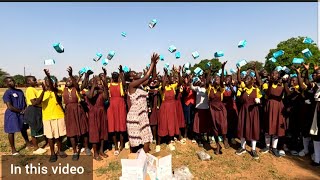 Giving the girls pads / African Nyako Foundation