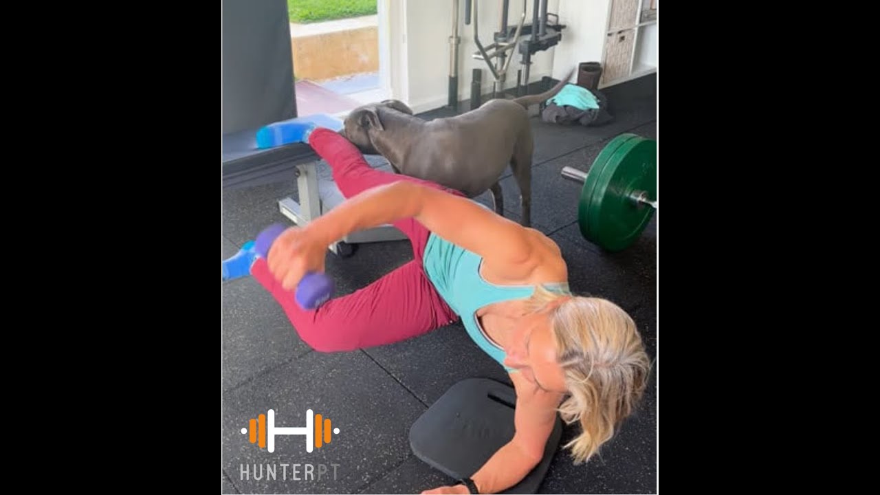 Copenhagen plank with lateral raises