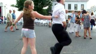preview picture of video 'Maddie K and her partner Evan in a lively East coast swing dance at Strawberry Moon Glastonbury 2009'