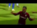 Jack Grealish scores after being attacked from behind by a fan