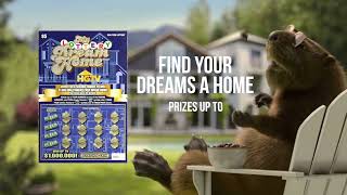  Beaver looking at a photo of his dream home