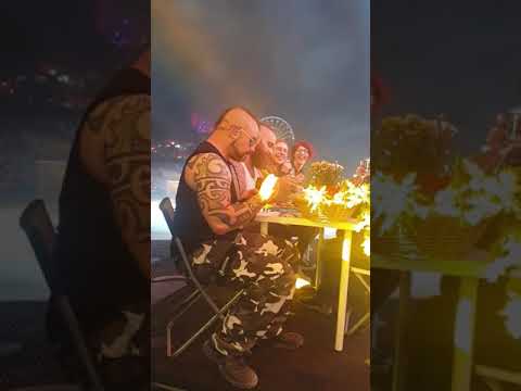 SABATON singer Joakim drinks and eats on stage at Hellfest 2019