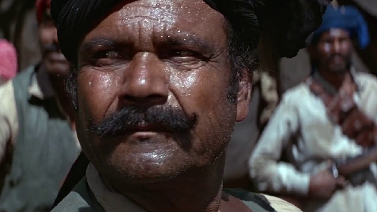 Bond is hunted by Kamal Khan in the jungle