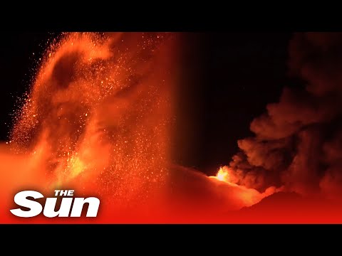 Fountains of lava shoot from Mount Etna as eruptions continue