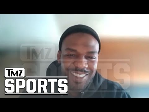 Jon Jones Says He 'Absolutely Sucked' At Football, Unlike NFL Brothers | TMZ Sports