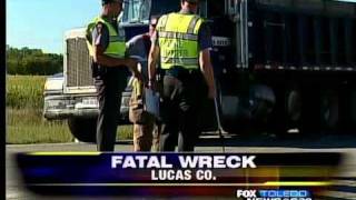 preview picture of video '1 dead as 2 dump trucks, car collide'